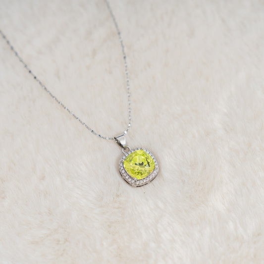 Lime Radiance Pendant Necklace – Cushion-Cut Lime Yellow Lab-Created Gemstone with Cubic Zirconia Halo, Silver-Tone Chain – Elegant Jewelry for Women, Ideal Gift for All Occasions